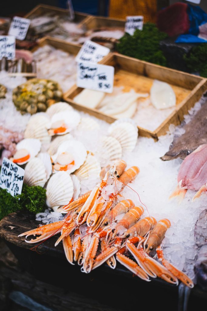 a bunch of different types of seafood on display